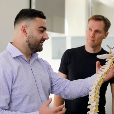 Altius Group Career Man Teaching Human Spine